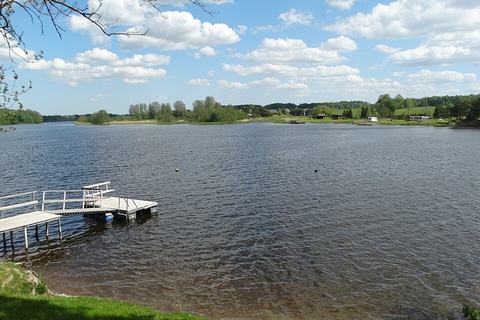 Small floating pontoon and walkway on a lake
