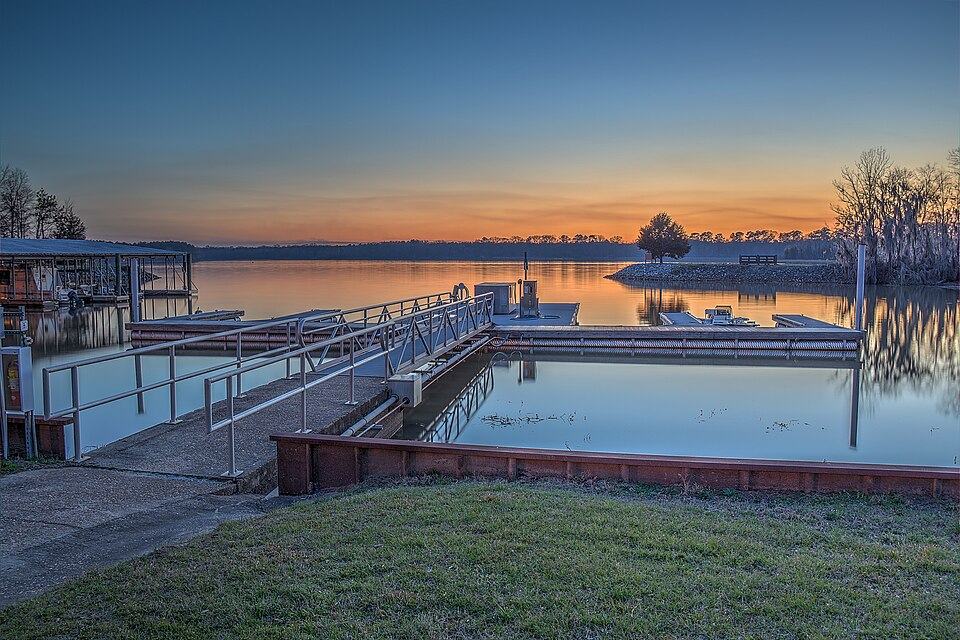 Floating platform on open water at dusk